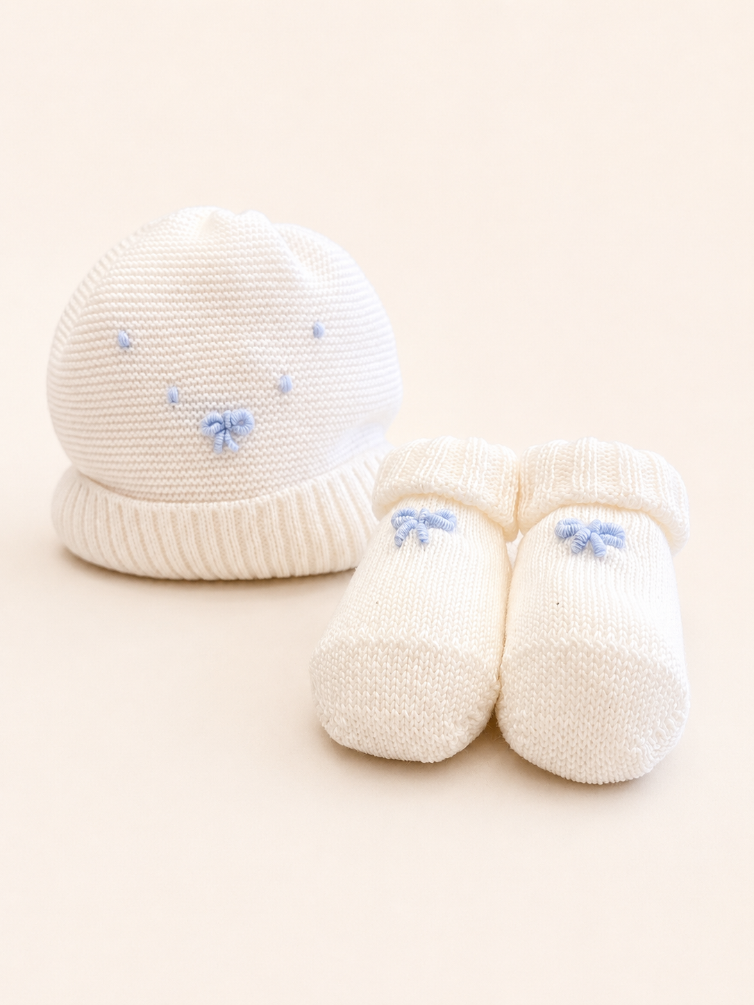 Set cappellino e scarpette
