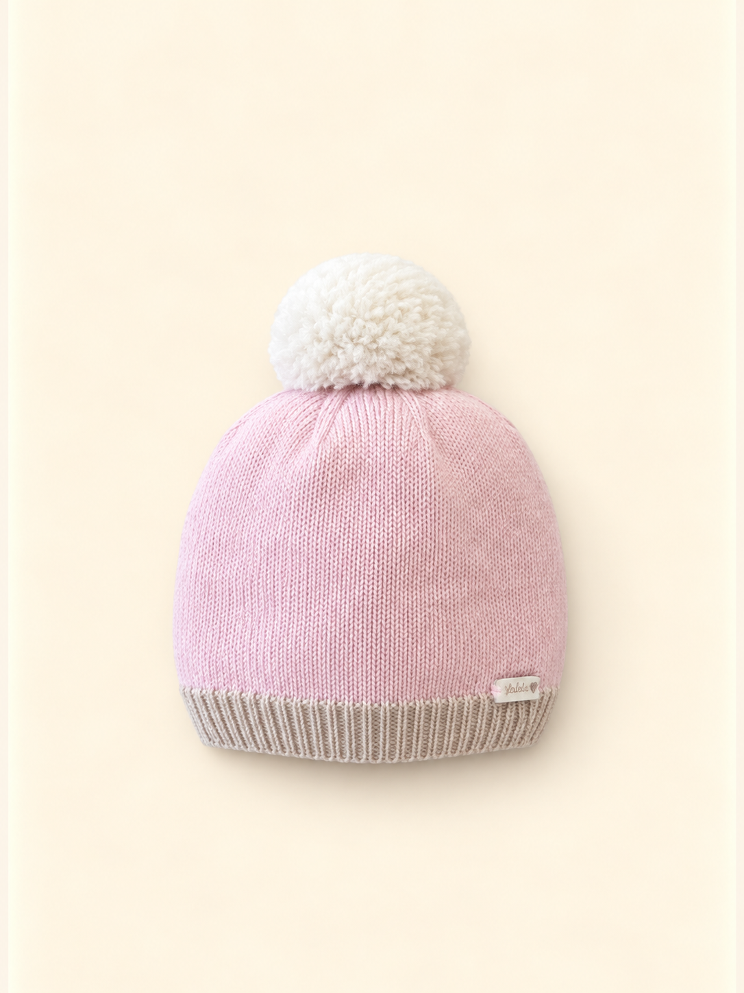 Cappellino rosa con pon pon