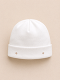 Cappellino bianco pois