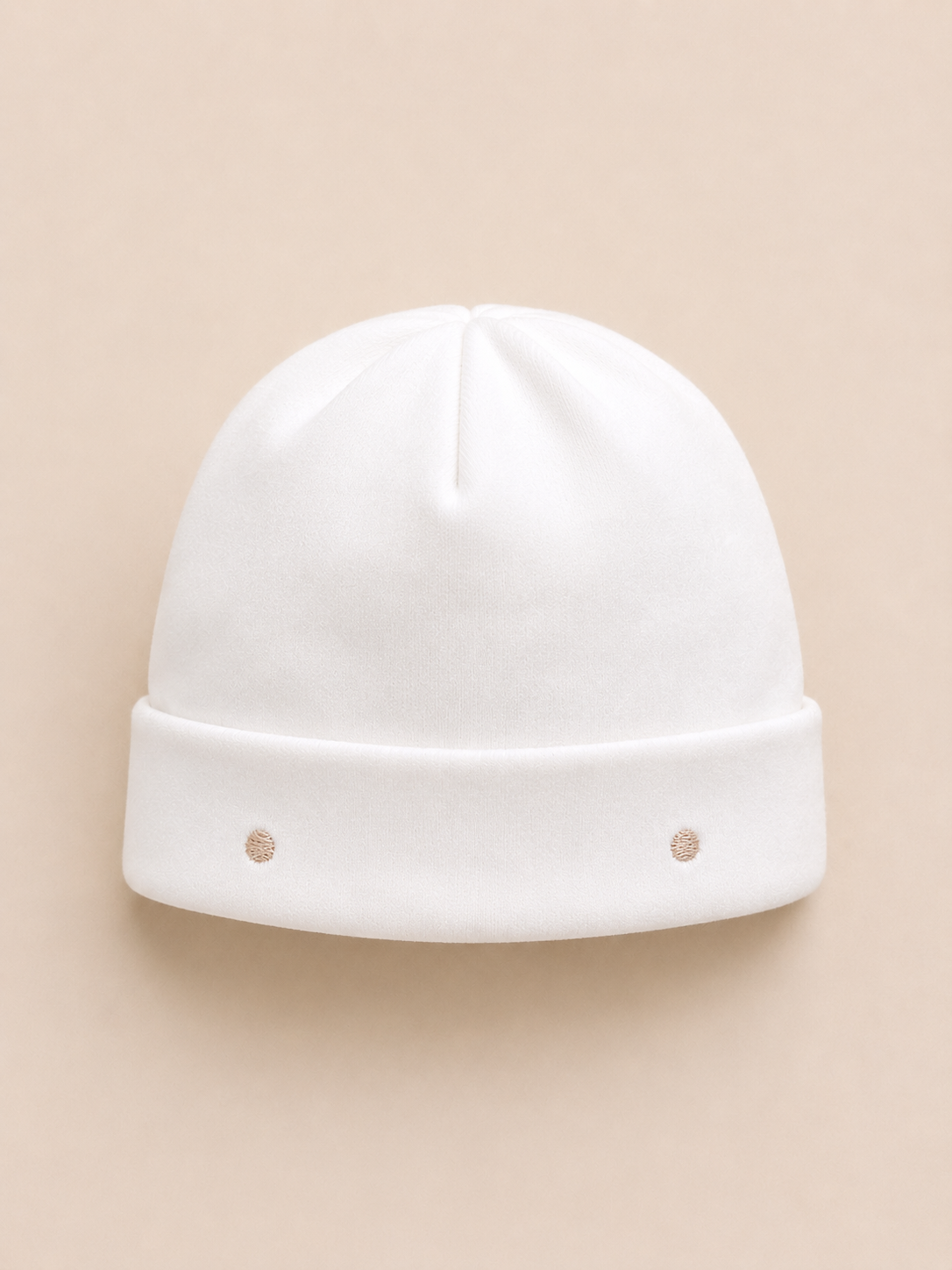Cappellino bianco pois