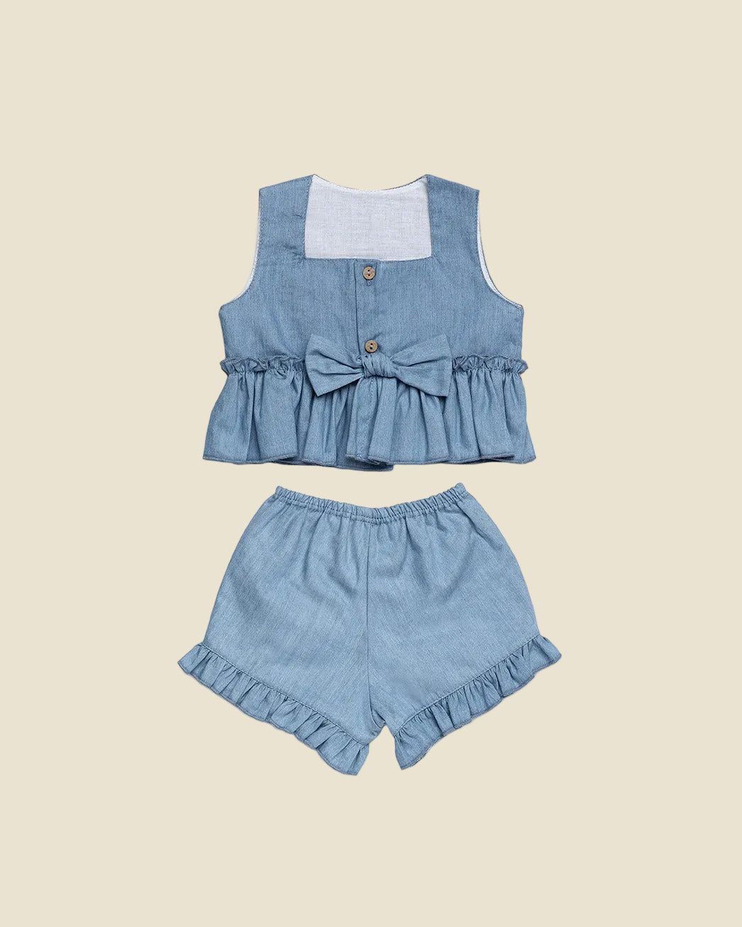 Completino a jeans con fiocco