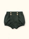 Pantaloncini verde con bottoncino